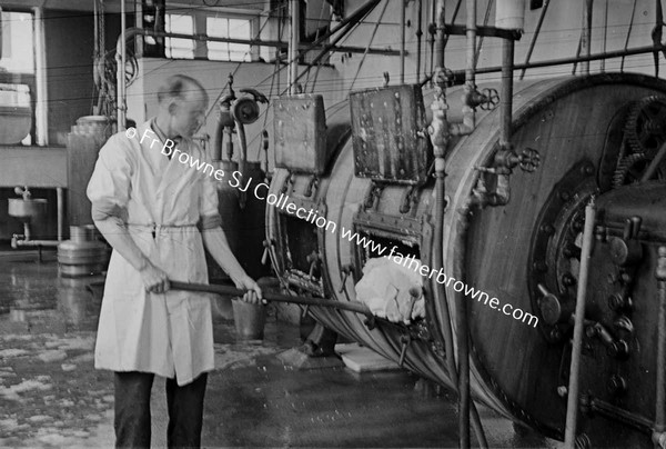 CREAMERY REMOVING FINISHED BUTTER FROM CHURN